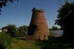 Wind pump tower by disused clay pit and brickworks, Sutton Ings (geograph 4547859).jpg