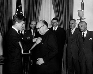 President John F. Kennedy presents the Medal of Freedom to Paul-Henri Spaak
