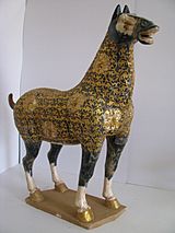 Tang Dynasty-Blue spotted 'leopard' horse. Body cladded in gilded filigree