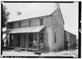 Historic American Buildings Survey Alex Bush, Photographer, May 11, 1935 FRONT (S) AND EAST SIDE - The Rock House, U.S. Route 280 (State Route 38), Harpersville, Shelby County, HABS ALA,59-HARP.V,1-1