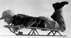 Boy on snow sled, 1945