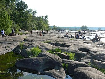 People on rocks of Belle Isle, James River, Richmond, Virginia.JPG