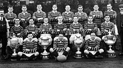 Huddersfield rugby team with cups