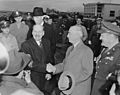 Photograph of British Prime Minister Clement Attlee shaking hands with Secretary of State James Byrnes upon his... - NARA - 199245
