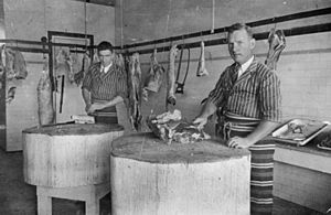 StateLibQld 2 179199 Claude Burton in his butcher shop in Wondai, Queensland, 1935