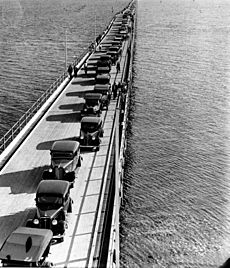 Aerial view of cars and pedestrians on the Hornibrook Highway Bridge Redcliffe 1935 (7960321652)