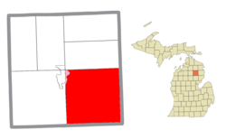 Location within Oscoda County (red) and an administered portion of the Mio community (pink)