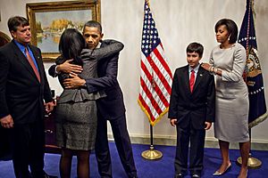 Obama and family of Christina Taylor Green 2011