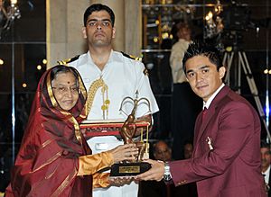The President, Smt. Pratibha Devisingh Patil presenting the Arjuna Award for the year-2011 to Shri Sunil Chhetri for Football, in a glittering ceremony, at Rashtrapati Bhavan, in New Delhi on August 29, 2011