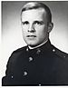 A black and white image of Graves wearing his Marine Corps dress blue uniform without his hat.