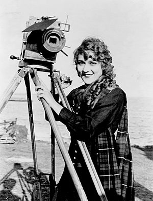 Mary Pickford on Beach with Camera, ca. 1916 (LOC)