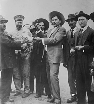 Rodolfo Fierro (center) with Francisco Villa Raul Madero (cropped)