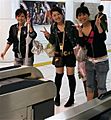 Girls giving peace sign, Tokyo