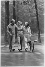 Photograph of President Gerald Ford and First Lady Betty Ford Walking with Their Daughter Susan and Their Dog... - NARA - 186835