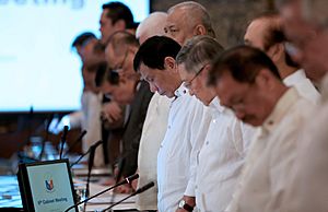 President Rodrigo Duterte and his Cabinet members pray before the start of the 6th Cabinet Meeting