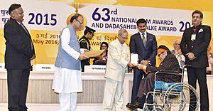 The President, Shri Pranab Mukherjee presenting the Dada Saheb Phalke Award to the Actor Shri Manoj Kumar, at the 63rd National Film Awards Function, in New Delhi