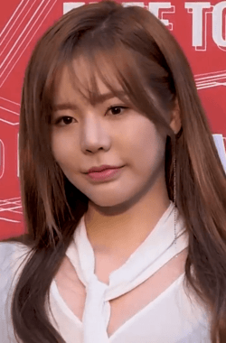 Sunny wearing white outfit in April 2018