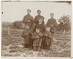 Native American boarding school-Teacher and young boys posed for photograph