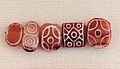 Indus carnelian beads with white design imported to Susa in 2600-1700 BCE LOUVRE Sb 13099