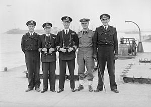 Allied Naval C in C in Normandy. 24 July 1944, Arromanches. the Visit of Admiral Sir Bertram Ramsay, Kcb, Kbe, Mvo, Allied Naval Commander, Expeditionary Force, To Mulberry 'b', at Arromanches. A24857