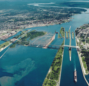 Aerial view of the St. Marys River; Whitefish Island is just to the left of the rapids.