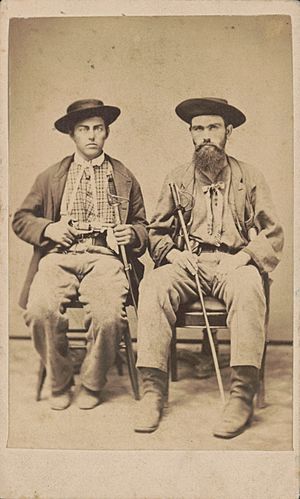 Two unidentified Border Ruffians with swords) - Blackall, photographer, Clinton, Iowa LCCN2016646192