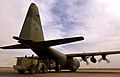 Australian C-130 H being unloaded at Tallil Air Base in April 2003