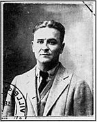 French identity card photo of F. Scott Fitzgerald. He is facing the camera, and the picture has been stamped in the lower left corner. Fitzgerald is wearing a white suite and black tie. His hair is parted in the middle.