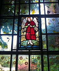 Stained glass window of Love at Red House