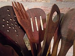 Wooden spoons and other utensils for frying.