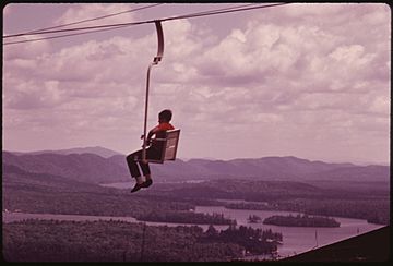 MCCAULEY MOUNTAIN, NEW YORK, CHAIR LIFT GIVES TOURISTS A PANORAMIC VIEW IN THE ADIRONDACK FOREST PRESERVE - NARA - 554490.jpg