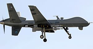 Armed RAF Reaper Aircraft Approaches Kandahar Airfield, Afghanistan MOD 45152092