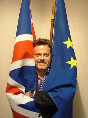 Eddie Izzard with EU and UK flags