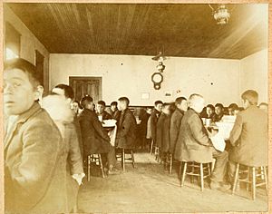 Native American boarding school-Young boys eating in the dining hall