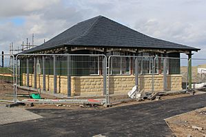 Caddie Pavilion under construction-geograph-6534075-by-Graeme-Yuill (cropped)