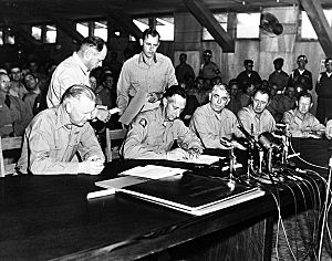 General Clark signs the Korean Armistice Agreement