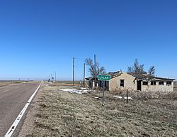 Looking east along State Highway 116 in Lycan.
