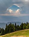 Trees and clouds with a hole, Karawanks, Slovenia
