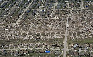 Shown here May 22, 2013, is an aerial view of homes destroyed by a tornado in Moore, Okla 130522-F-IE715-379