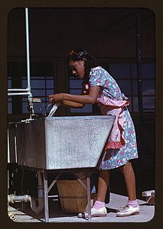 Young woman at the community laundry on Saturday afternoon, FSA ... camp, Robstown, Tex. (LOC)