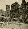 Damaged buildings of the Riga Old Town and St. Peter's Church during the World War II, 1939-1945