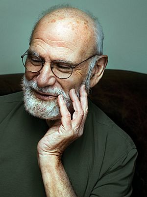 A grey-haired Oliver Sacks with glasses and a beard