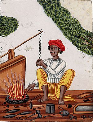 A blacksmith in front of his fire with one hand on a chain attached to the bellows