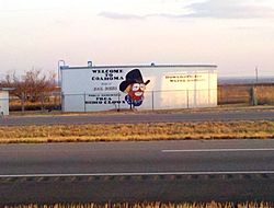 A water tank depicting Coahoma Justice of the Peace and well-known rodeo clown Quail Dobbs, located on Interstate 20 near Coahoma