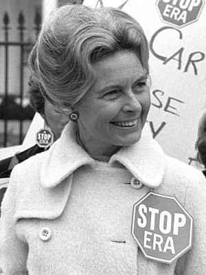 Activist Phyllis Schafly wearing a "Stop ERA" badge, demonstrating with other women against the Equal Rights Amendment in front of the White House, Washington, D.C. (42219314092) (cropped 2).jpg
