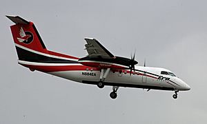 ERA Aviation prop plane landing at ANC (6194226738)