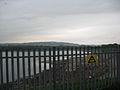 Llanishen Reservoir (semi-drained) - view of fence with surveillance sign