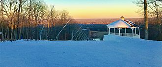 View downhill from the Middlefield ski slope at sunset in Powder Ridge Mountain Park and Resort.