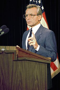 Frank Carlucci at a press conference, 1988