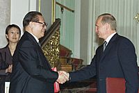 Putin and Jiang Zemin document-signing ceremony 2001.jpg